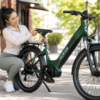 Woman adjusting e-bike seat height for short rider fit