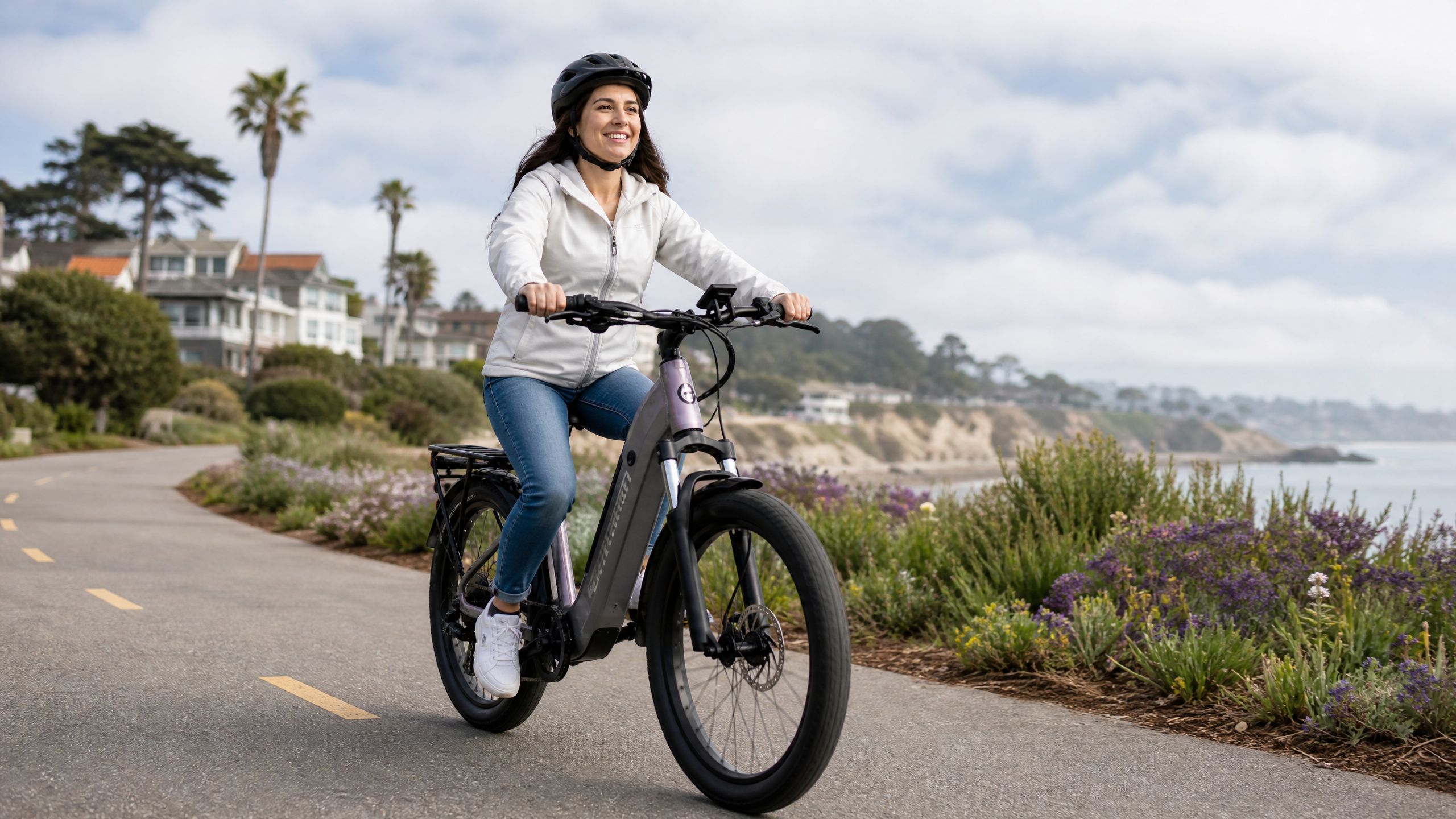 A confident short woman riding a perfectly fitted electric bike, emphasizing comfort and control.
