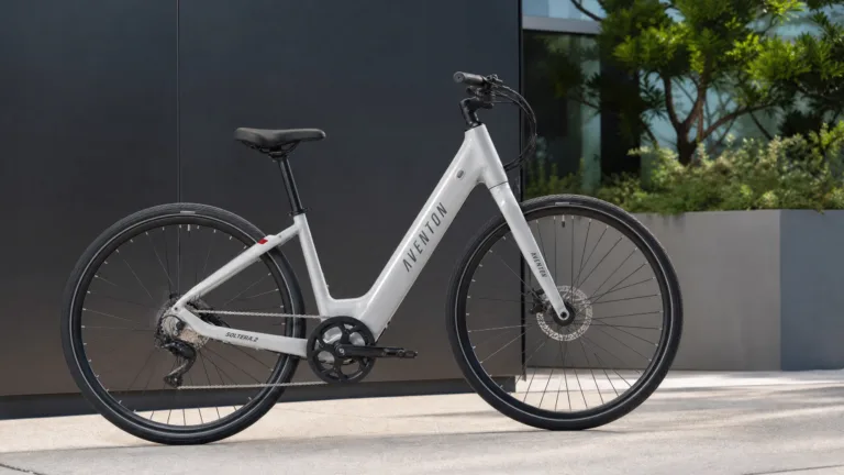 Step-through e-bike against a wall