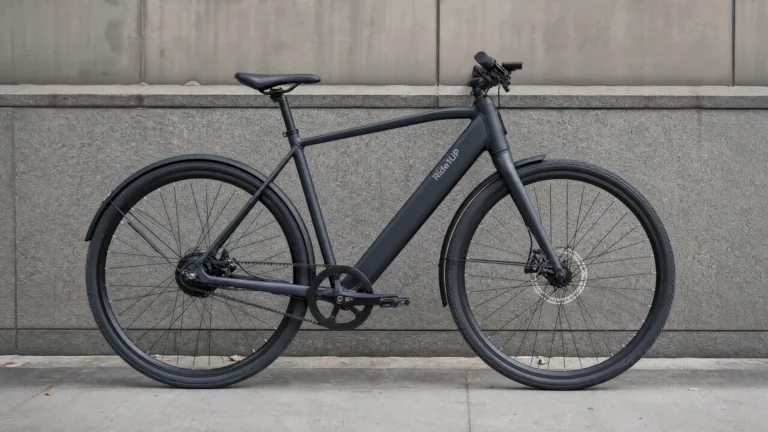 Lightweight city e-bike leaning on a wall
